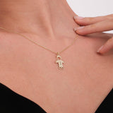 A graceful touch highlights the polished boy name pendant in solid gold.