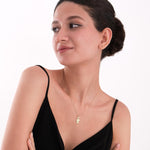 Delicate and minimal, this gold boy pendant makes a thoughtful gift for mothers.