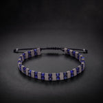 Men's lapis lazuli and hematite natural stone bracelet on an adjustable cord
