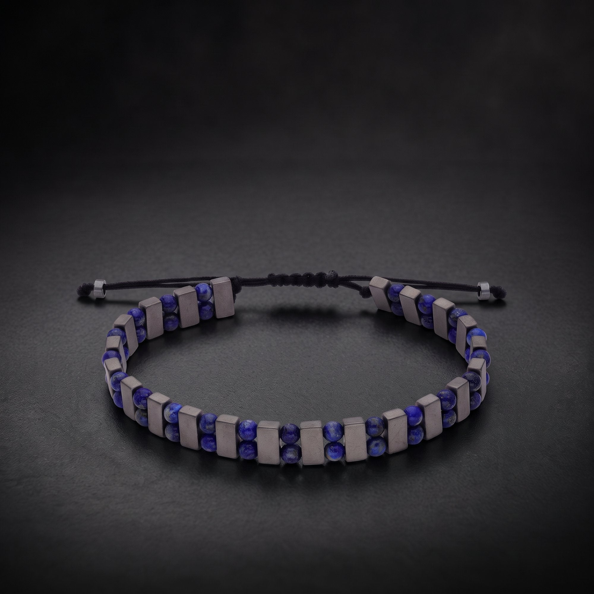 Men's lapis lazuli and hematite natural stone bracelet on an adjustable cord