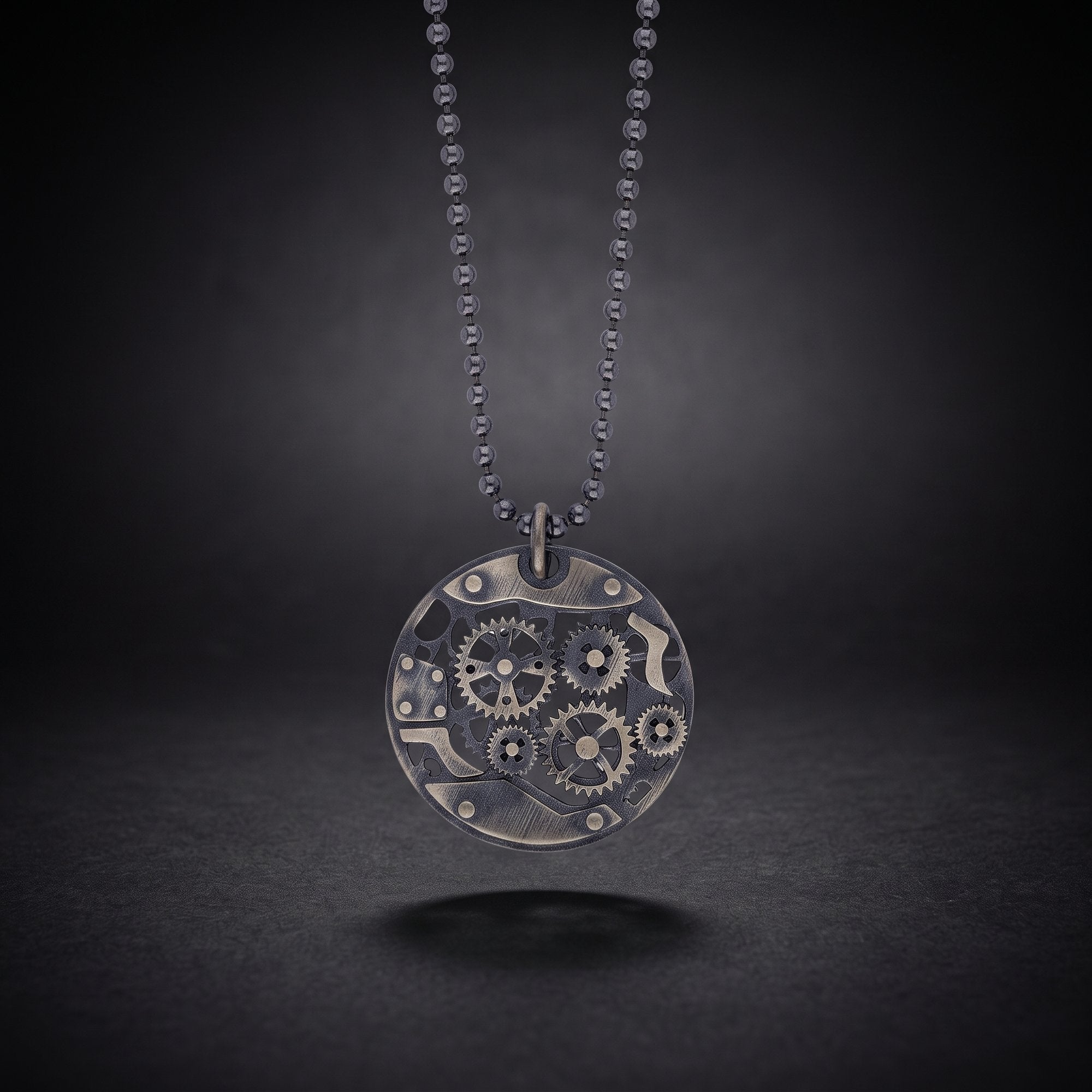 Men's mechanical gear necklace in sterling silver, a round steampunk gear pendant on a ball chain