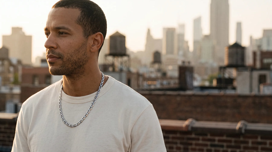 Man on a New York rooftop wearing a sterling silver mariner chain
