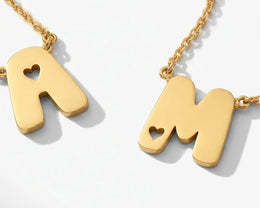 Gold bubble initial necklaces A and M