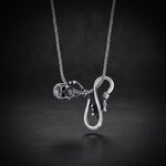 Men's skull and hand infinity necklace in 925 sterling silver