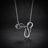 Men's skull and hand infinity necklace in 925 sterling silver