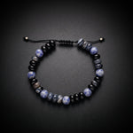 Men's sodalite and black onyx natural stone bracelet on an adjustable cord