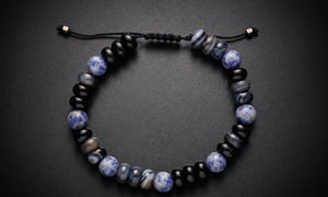 Men's sodalite and black onyx natural stone bracelet on an adjustable cord
