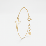 Gold cross bracelet for women with an open sideways cross on a dainty cable chain, extender and 585 gold tag