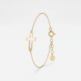 Gold cross bracelet for women with an open sideways cross on a dainty cable chain, extender and 585 gold tag